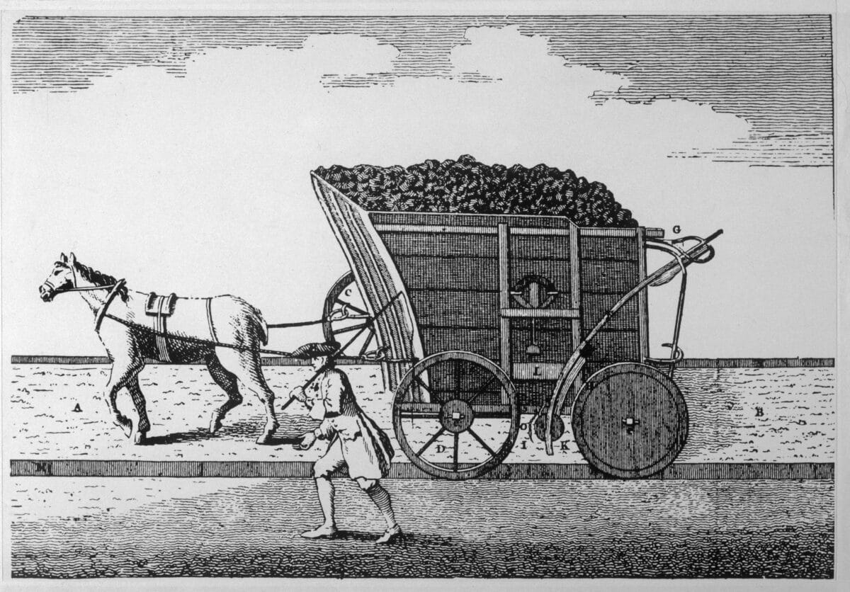 A horse-drawn coal wagon on rails