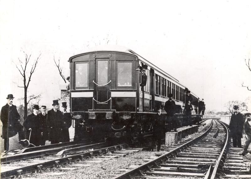 A black and white photo of the trial trip of the first Metropolitan Railway electric train on 13 December 1904