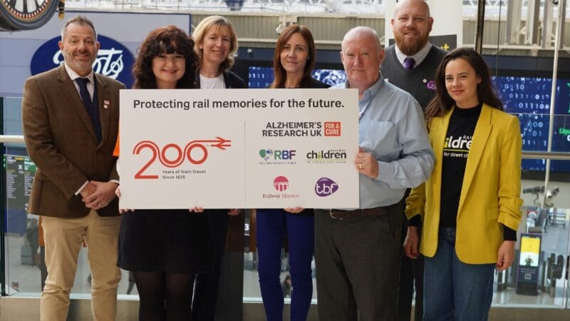 A photo of the Railway 200 charity partnerships standing at Waterloo